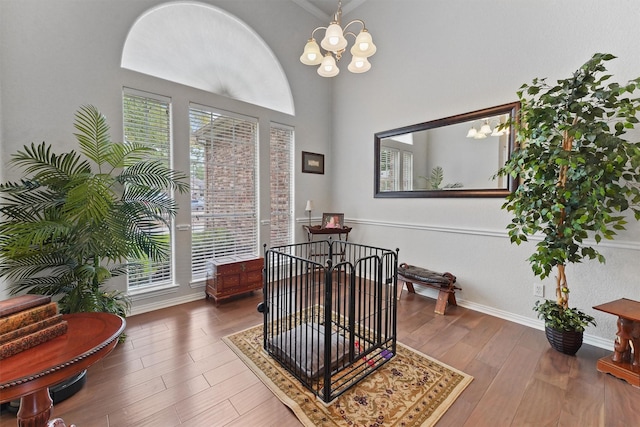 3330 Lake Island Dr, Montgomery, TX 77356 - living area featuring a chandelier and wood finished floors