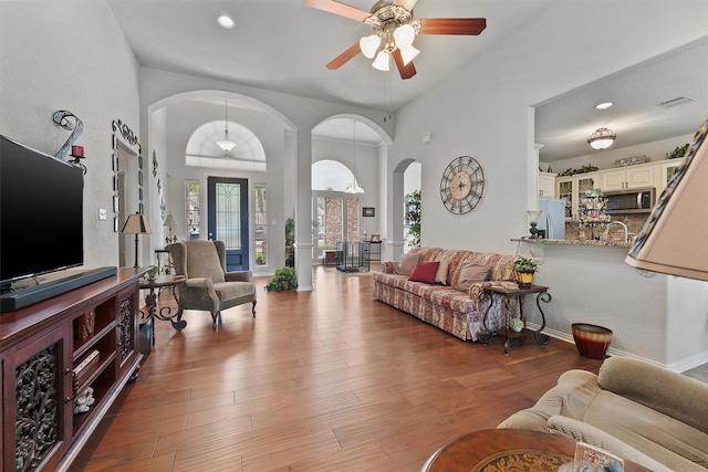 3330 Lake Island Dr, Montgomery, TX 77356 - living room featuring arched walkways, ceiling fan, wood finished floors, and recessed lighting
