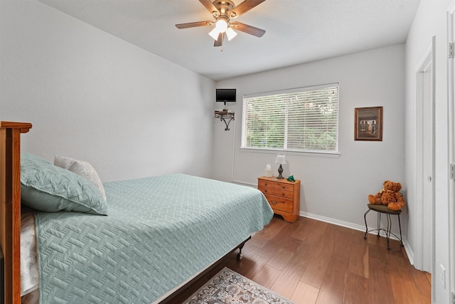 3330 Lake Island Dr, Montgomery, TX 77356 - bedroom featuring wood finished floors and a ceiling fan