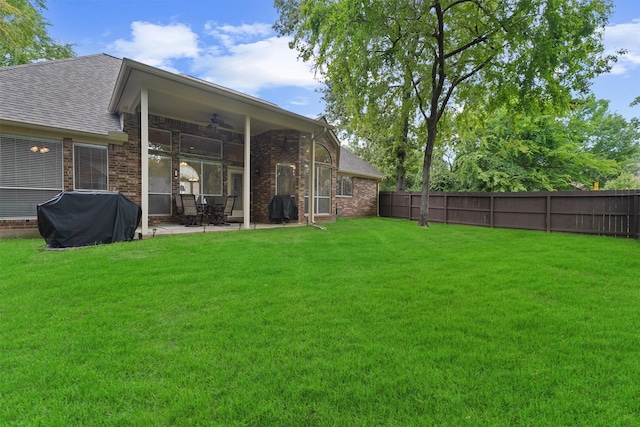 3330 Lake Island Dr, Montgomery, TX 77356 - fenced backyard featuring a ceiling fan and a patio area