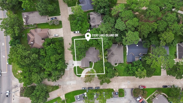 3330 Lake Island Dr, Montgomery, TX 77356 - aerial view of property's location featuring property parcel outlined and nearby suburban area