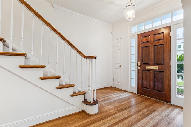 1976 Vermont St, Houston, TX 77019 - entrance foyer with stairway, wood finished floors, and crown molding