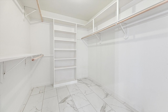 1976 Vermont St, Houston, TX 77019 - spacious closet featuring marble finish flooring