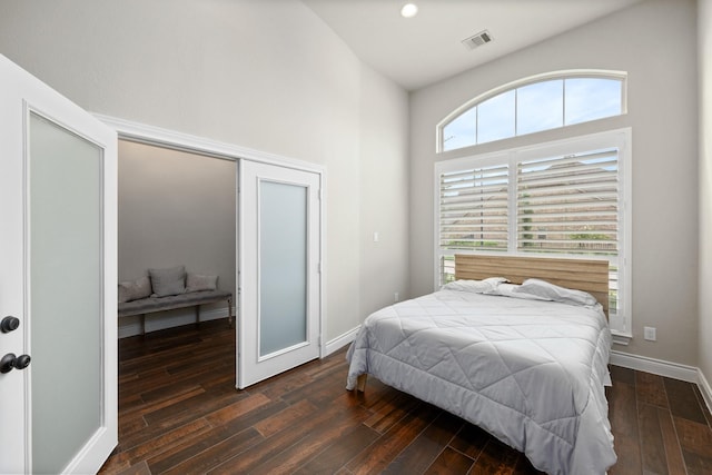 19219 Spotted Bass Ln, Cypress, TX 77433 - bedroom with dark wood-type flooring and a high ceiling