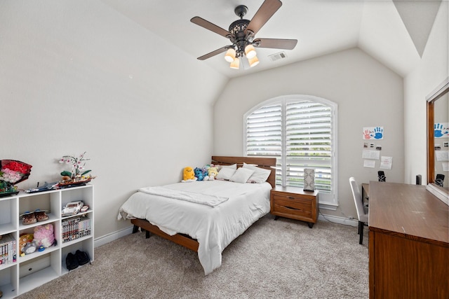 19219 Spotted Bass Ln, Cypress, TX 77433 - bedroom with light colored carpet, lofted ceiling, and a ceiling fan