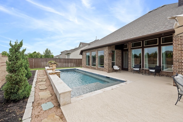 19219 Spotted Bass Ln, Cypress, TX 77433 - view of pool with a patio area and a fenced backyard