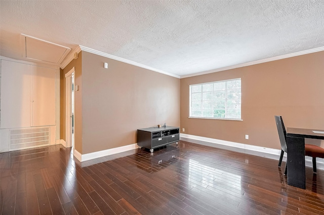 4610 Brinkman St, Houston, TX 77018 - spare room featuring a textured ceiling, dark wood-style flooring, and crown molding