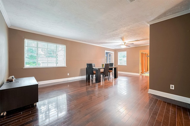 4610 Brinkman St, Houston, TX 77018 - dining space featuring a textured ceiling, a ceiling fan, dark wood-style floors, and ornamental molding