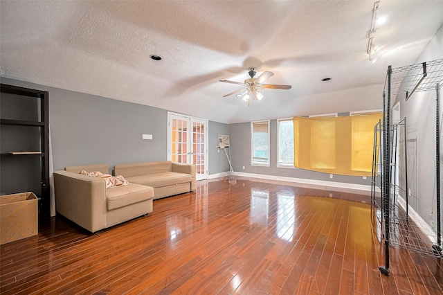 4610 Brinkman St, Houston, TX 77018 - living area with a textured ceiling, a ceiling fan, and wood finished floors
