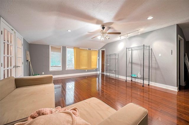 4610 Brinkman St, Houston, TX 77018 - living room featuring a textured ceiling, hardwood / wood-style floors, ceiling fan, vaulted ceiling, and recessed lighting