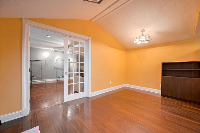 4610 Brinkman St, Houston, TX 77018 - additional living space with wood finished floors and vaulted ceiling