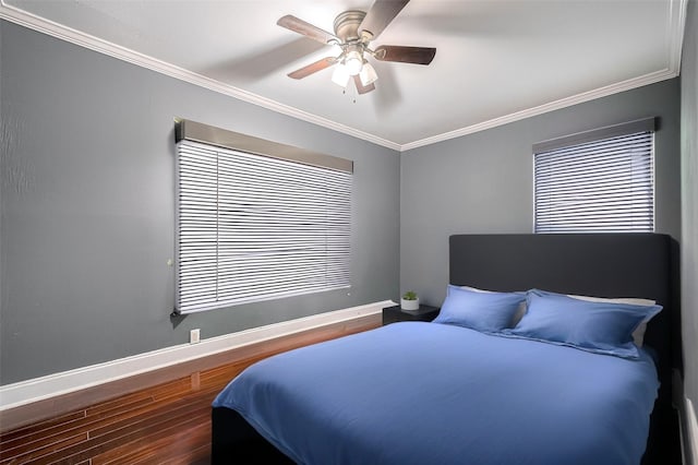 4610 Brinkman St, Houston, TX 77018 - bedroom featuring ornamental molding, wood finished floors, and a ceiling fan