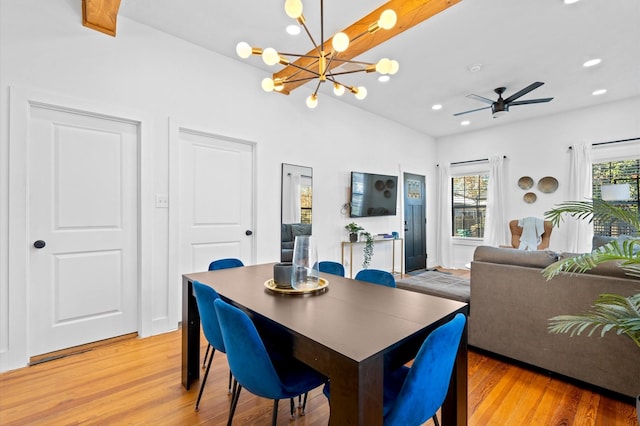 128 N Jenkins St, Houston, TX 77003 - dining space with light wood-style floors, ceiling fan, a chandelier, recessed lighting, and lofted ceiling