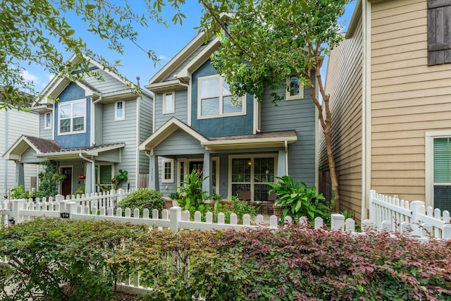 4663 Trembling Forest Ln, Houston, TX 77092 - view of front facade with a fenced front yard and covered porch