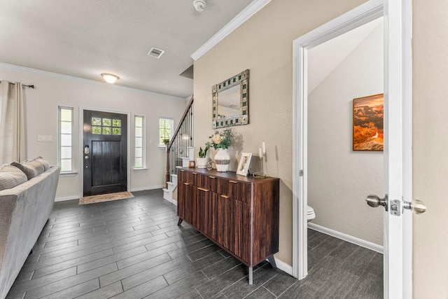 4663 Trembling Forest Ln, Houston, TX 77092 - entryway featuring dark wood-style floors, crown molding, and stairway