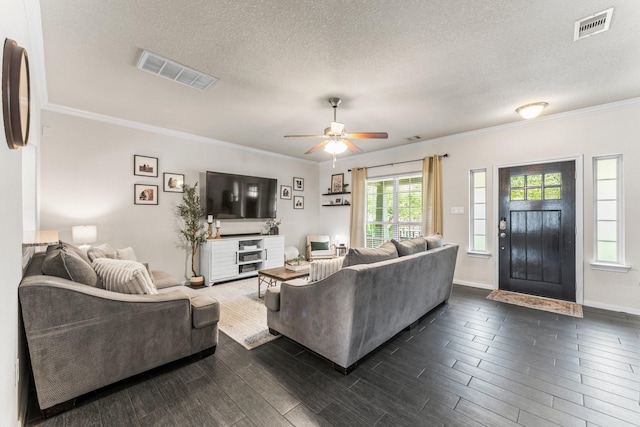 4663 Trembling Forest Ln, Houston, TX 77092 - living area with dark wood finished floors, a textured ceiling, crown molding, and ceiling fan