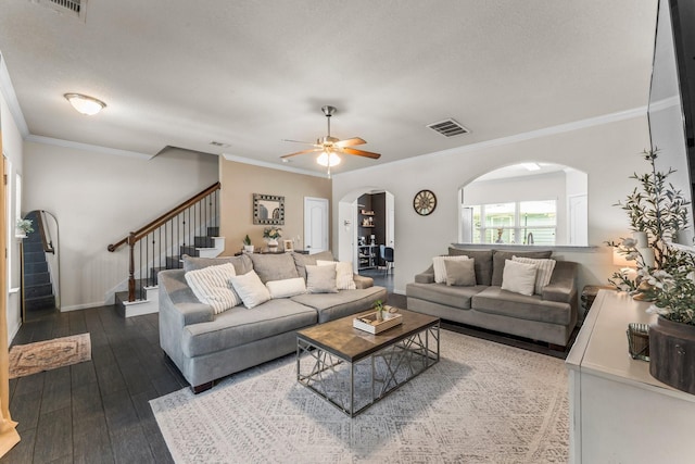 4663 Trembling Forest Ln, Houston, TX 77092 - living room featuring arched walkways, stairway, crown molding, ceiling fan, and wood-type flooring