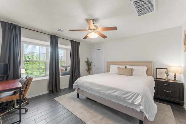 4663 Trembling Forest Ln, Houston, TX 77092 - bedroom with wood finished floors, ceiling fan, and an office area