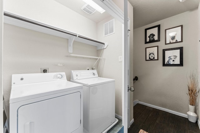 4663 Trembling Forest Ln, Houston, TX 77092 - laundry area with dark wood-style flooring and washing machine and dryer