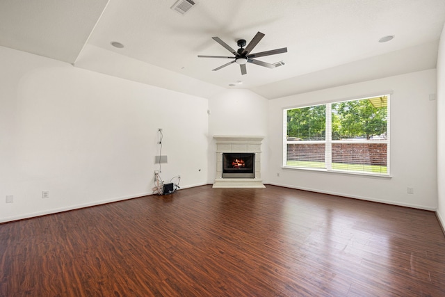 6230 Ledger Ln, Missouri City, TX 77459 - unfurnished living room with a ceiling fan, a fireplace, dark wood finished floors, and vaulted ceiling
