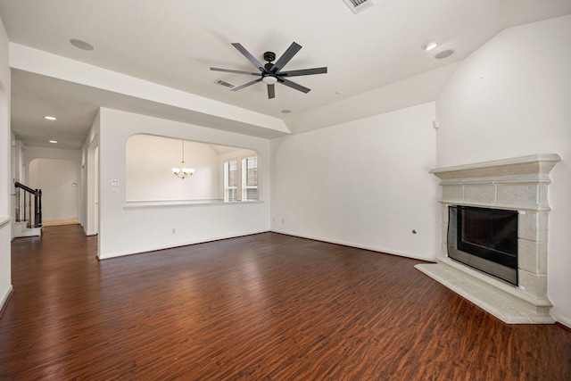6230 Ledger Ln, Missouri City, TX 77459 - unfurnished living room featuring a fireplace, dark wood-type flooring, a ceiling fan, stairway, and recessed lighting