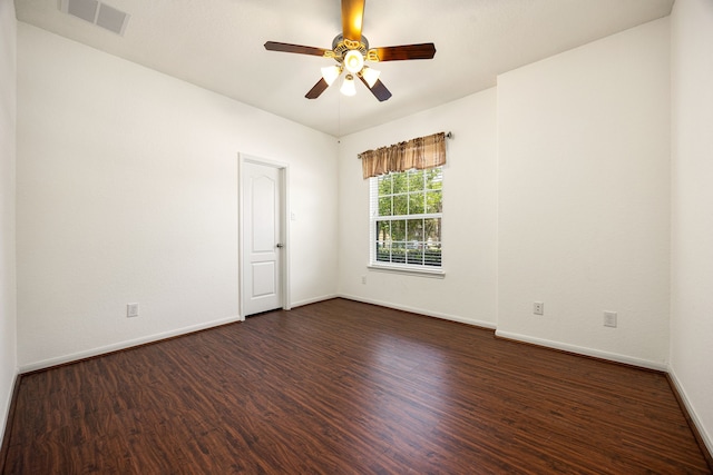 6230 Ledger Ln, Missouri City, TX 77459 - unfurnished room with dark wood finished floors and a ceiling fan