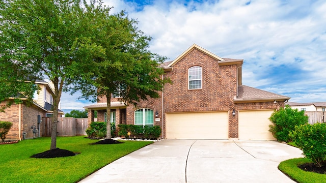 19334 St Winfred Dr, Spring, TX 77379 - traditional home featuring driveway, brick siding, a garage, and roof with shingles