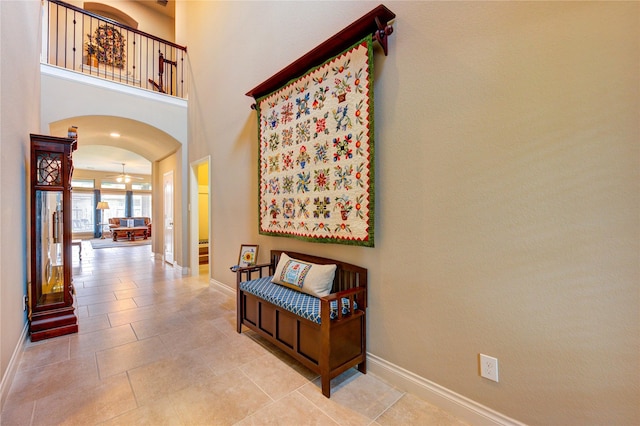 3411 Brampton Island Dr, Katy, TX 77494 - hallway with arched walkways and tile patterned flooring