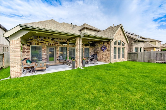 3411 Brampton Island Dr, Katy, TX 77494 - rear view of property with a ceiling fan, brick siding, a fenced backyard, and roof with shingles