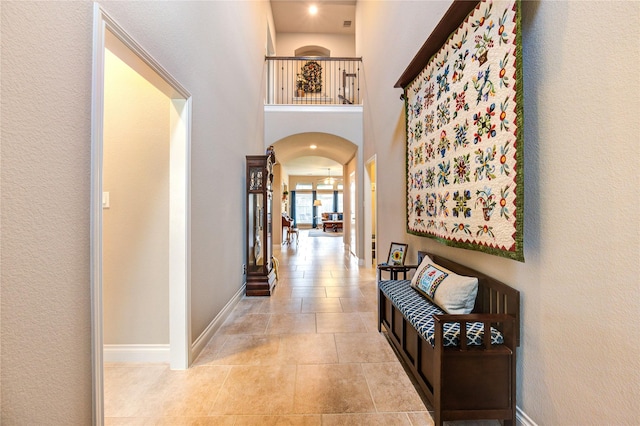 3411 Brampton Island Dr, Katy, TX 77494 - hall with arched walkways and tile patterned flooring