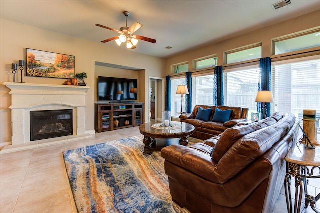 3411 Brampton Island Dr, Katy, TX 77494 - living area featuring ceiling fan, tile patterned flooring, and a fireplace