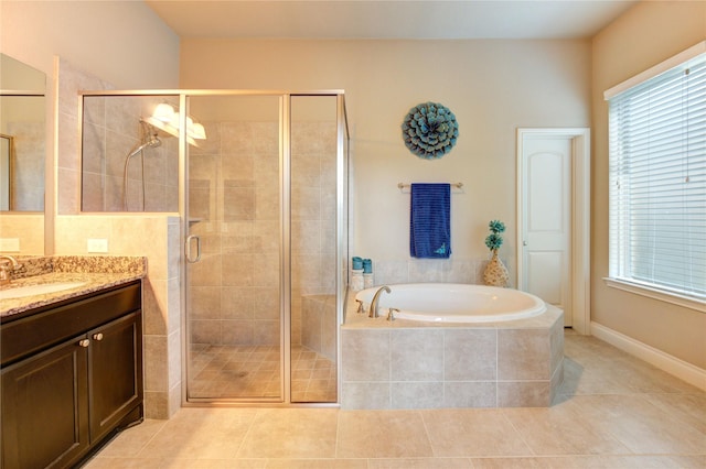 3411 Brampton Island Dr, Katy, TX 77494 - full bathroom with vanity, a garden tub, a shower stall, and tile patterned floors