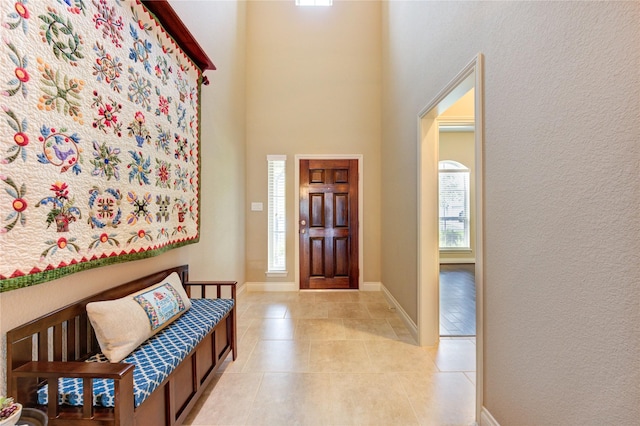 3411 Brampton Island Dr, Katy, TX 77494 - entrance foyer with light tile patterned floors and a towering ceiling