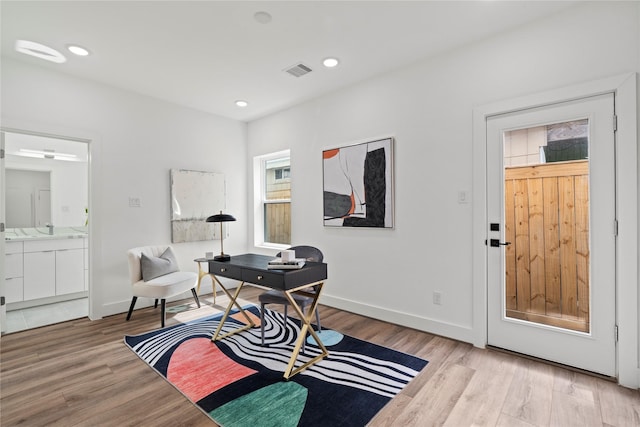 216 E 31st 1/2 St Unit B, Houston, TX 77018 - foyer with wood finished floors and recessed lighting