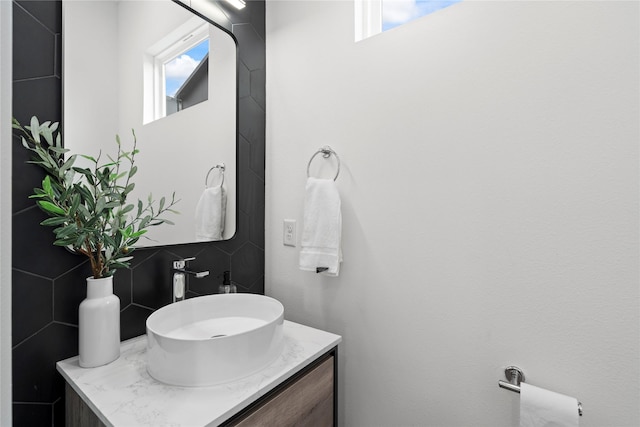 216 E 31st 1/2 St Unit B, Houston, TX 77018 - bathroom featuring vanity and tasteful backsplash