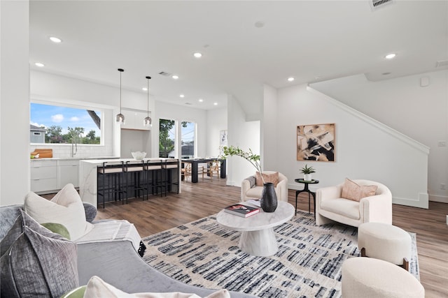 216 E 31st 1/2 St Unit B, Houston, TX 77018 - living area with light wood finished floors and recessed lighting