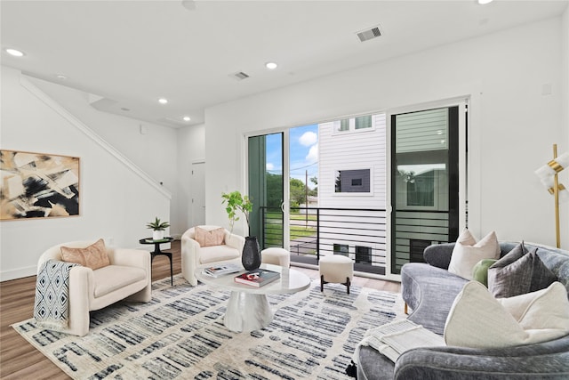 216 E 31st 1/2 St Unit B, Houston, TX 77018 - living room featuring wood finished floors and recessed lighting
