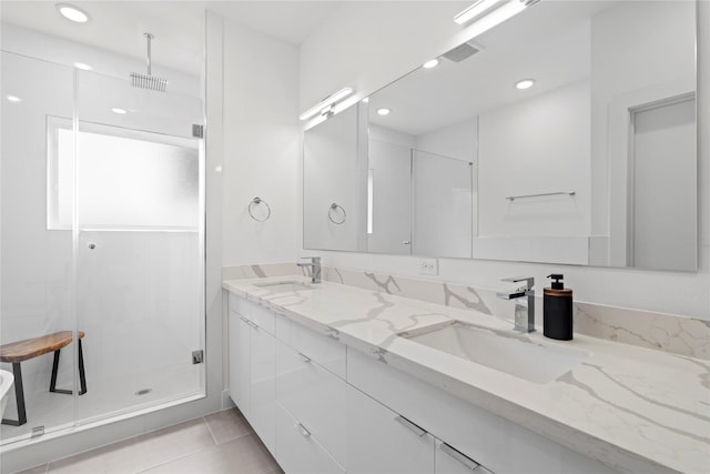 216 E 31st 1/2 St Unit B, Houston, TX 77018 - full bathroom with a shower stall, double vanity, tile patterned flooring, and recessed lighting