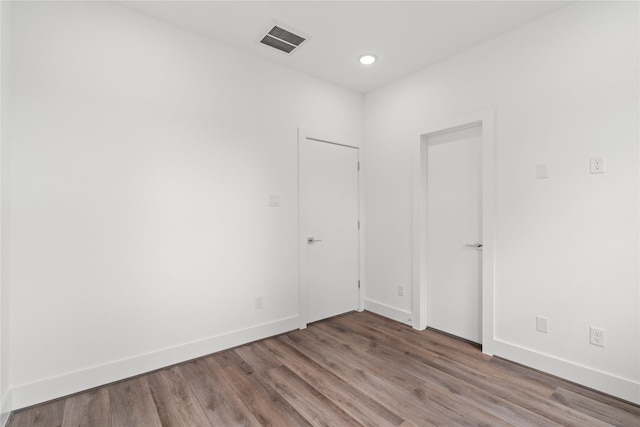 216 E 31st 1/2 St Unit B, Houston, TX 77018 - spare room featuring wood finished floors and recessed lighting