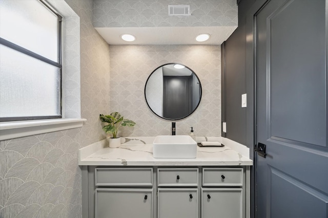 1802 Cedar Creek Ct, Houston, TX 77077 - bathroom with vanity and wallpapered walls
