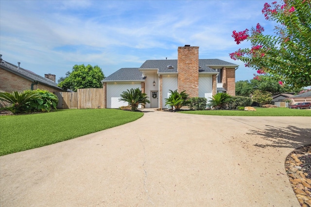 1802 Cedar Creek Ct, Houston, TX 77077 - view of front of property featuring driveway, a garage, a shingled roof, and a chimney