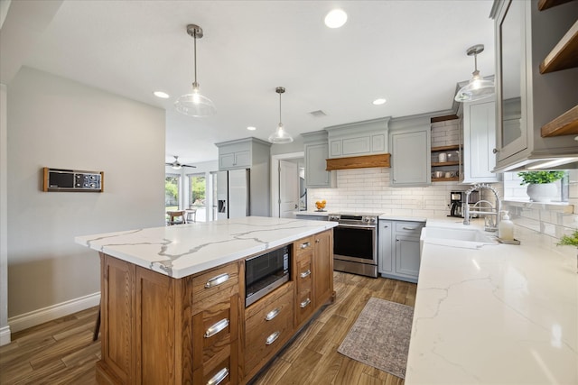 1802 Cedar Creek Ct, Houston, TX 77077 - kitchen with appliances with stainless steel finishes, open shelves, gray cabinets, tasteful backsplash, and recessed lighting