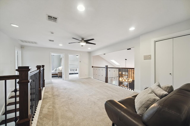 1802 Cedar Creek Ct, Houston, TX 77077 - living room featuring recessed lighting, light carpet, and a ceiling fan