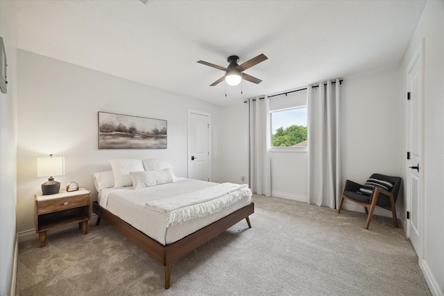 1802 Cedar Creek Ct, Houston, TX 77077 - bedroom with light colored carpet and ceiling fan