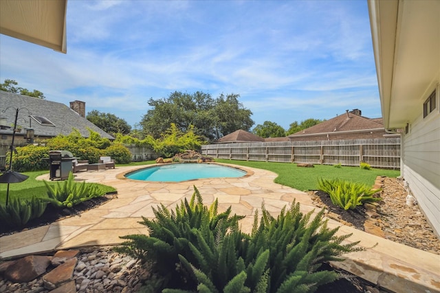 1802 Cedar Creek Ct, Houston, TX 77077 - view of pool with a fenced backyard, a patio, and area for grilling