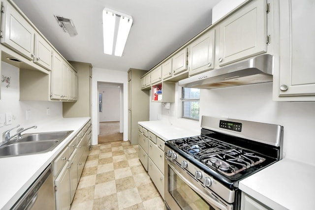 1404 Aldrich St, Houston, TX 77055 - kitchen with appliances with stainless steel finishes, under cabinet range hood, and light countertops