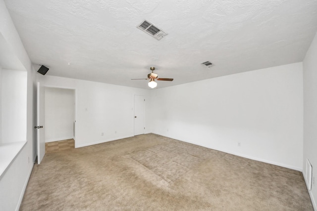 1404 Aldrich St, Houston, TX 77055 - empty room featuring light colored carpet and a ceiling fan