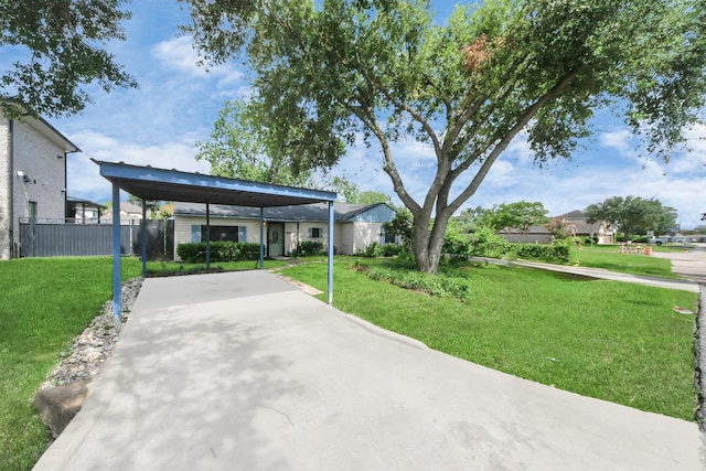 1404 Aldrich St, Houston, TX 77055 - view of patio featuring concrete driveway and a carport