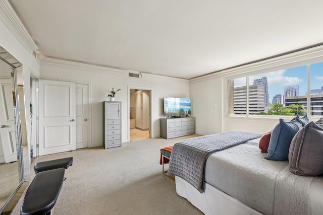 49 Briar Hollow Ln Unit 702, Houston, TX 77027 - bedroom with carpet floors, crown molding, and ensuite bathroom