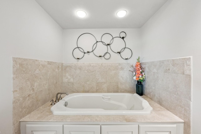49 Briar Hollow Ln Unit 702, Houston, TX 77027 - full bathroom with a garden tub